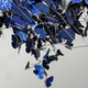 Illustration for article titled A Chandelier With Hundreds of Mini Perched Solar Cell Butterflies